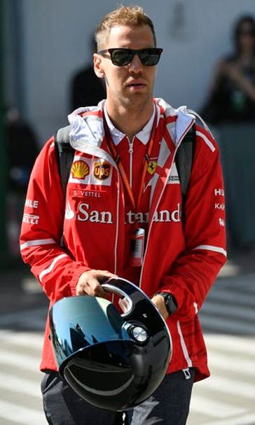 Vettel gets pole position, while Hamilton misses pole record